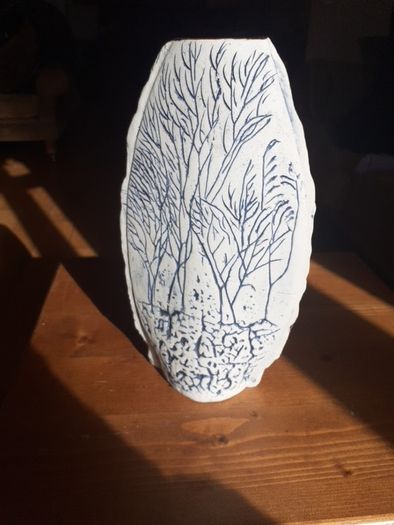 Pottery vase.