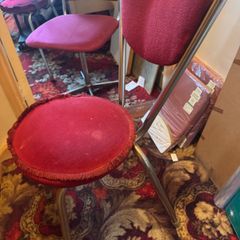 2 red velvet chairs read full ad