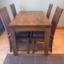 Wooden dining table and four chairs Image 2