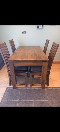 Wooden dining table and four chairs