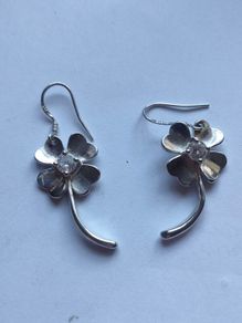 A pair of Sterling Silver earrings.
