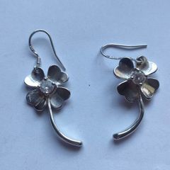 A pair of Sterling Silver earrings.
