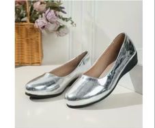 BARGAIN//// Brand new low silver wedge size 6.5