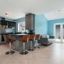 Modern Grey Kitchen Cabinets, Large Island Counter, 4 Bar Stools Image 2