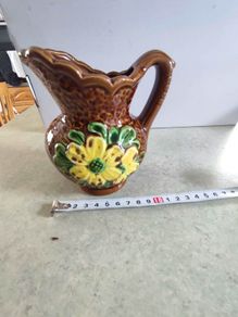 Vintage small brown pitcher embossed yellow daisies daisy decorative