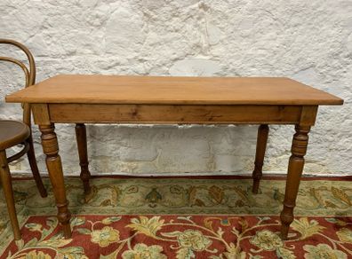 A 19th Century Victorian pine farmhouse preparation table with turned legs.