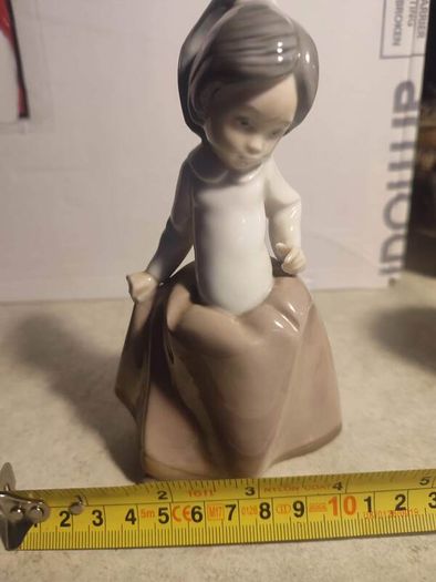 Lladro Nao Young Girl Porcelain Figurine in Tan Dress