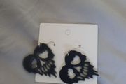 melting skull heart earrings