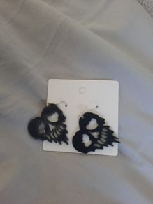melting skull heart earrings
