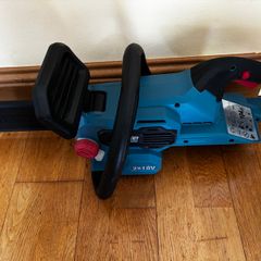 Cordless chainsaw Erbauer