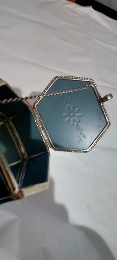 Lovely jewellery box ,,with bevelled mirrors sides and design, see pictures for condition,,take as is ,buyer collects or pays postage thank you