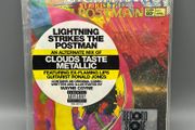 The Flaming Lips - Lightning Strikes The Postman (An Alternate Mix Of Clouds Taste Metallic) CD + Comic