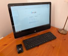 HP Envy 23 All-In-One computer running Linux Mint