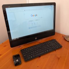 HP Envy 23 All-In-One computer running Linux Mint