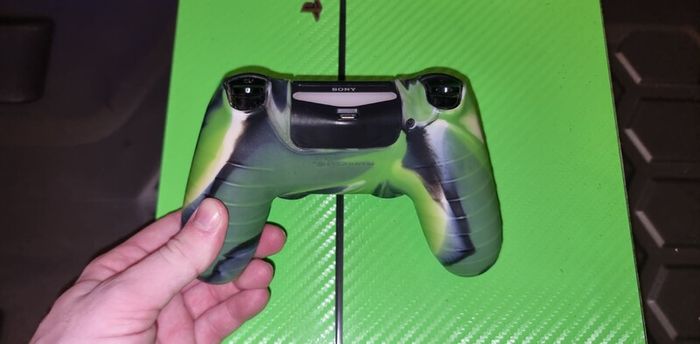 Playstation 4 with two controllers