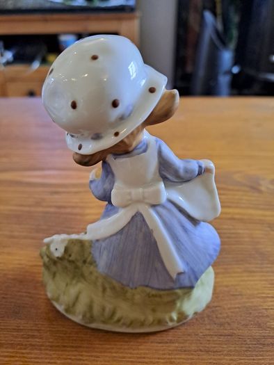 Vintage Porcelain figurine girl holding cat