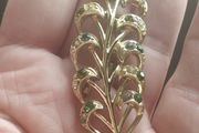 Vintage Brooch with Green Rhinestones.