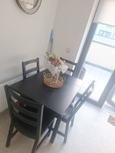 black ikea table and chairs