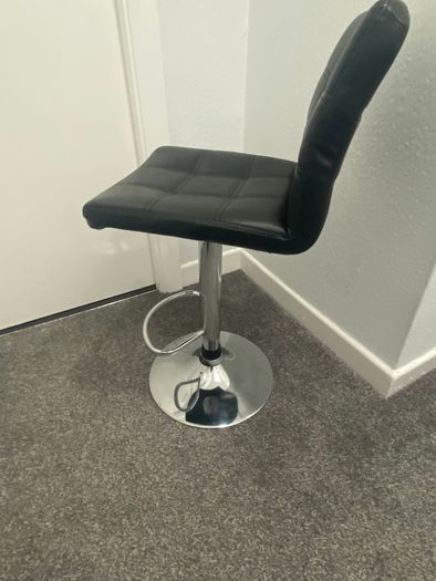 Black faux leather bar stool