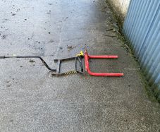 Berg front linkage and bale carrier