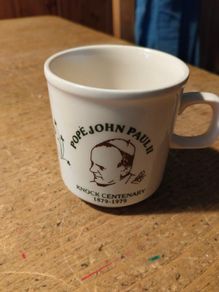 vintage commemorative mug honors the 1979 visit of Pope John Paul II to Knock, Ireland.