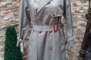 Vintage Nuage ladies trenchcoat Approximately late 90s early 00s Size 10 on label The colour is a pale bluey grey with brown buttons It's got an inner lining that can be removed