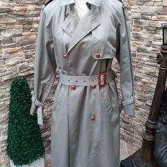 Vintage Nuage ladies trenchcoat Approximately late 90s early 00s Size 10 on label The colour is a pale bluey grey with brown buttons It's got an inner lining that can be removed