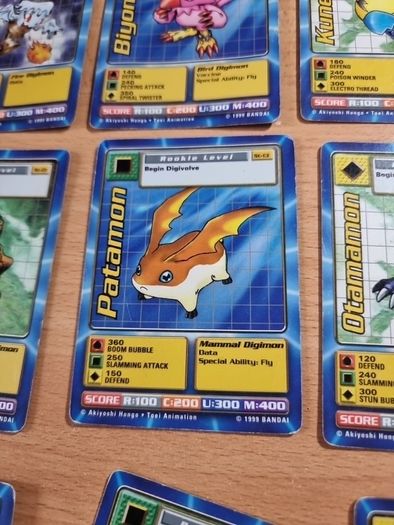 12 Rookie level Digimon cards. 1999