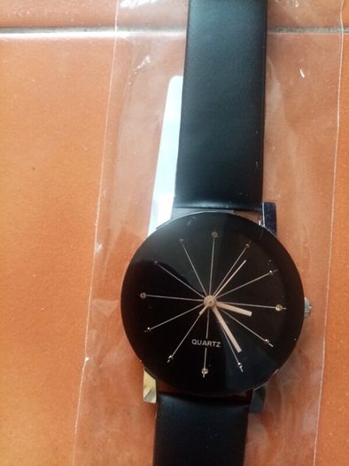 New mens casual watch. Black strap.
