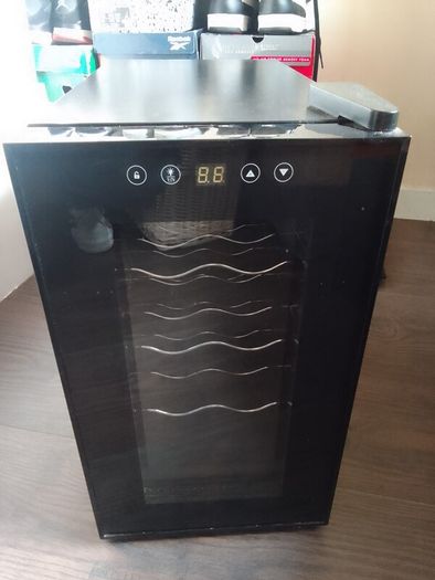 wine cooler fridge 8 bottle capacity.