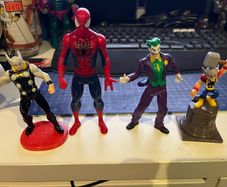 4 Comic book figures Spider-Man Joker Thor