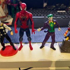 4 Comic book figures Spider-Man Joker Thor