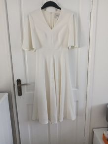 ladies LK Bennett dress. Bought for 360. Wore once for wedding. Sizing says 6 more like 8 to 10. Petite
