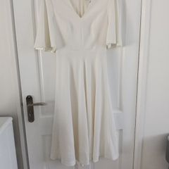 ladies LK Bennett dress. Bought for 360. Wore once for wedding. Sizing says 6 more like 8 to 10. Petite