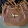 Nina Ricci pebbled leather bucket bag Image 3