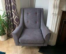 Grey swivel chair