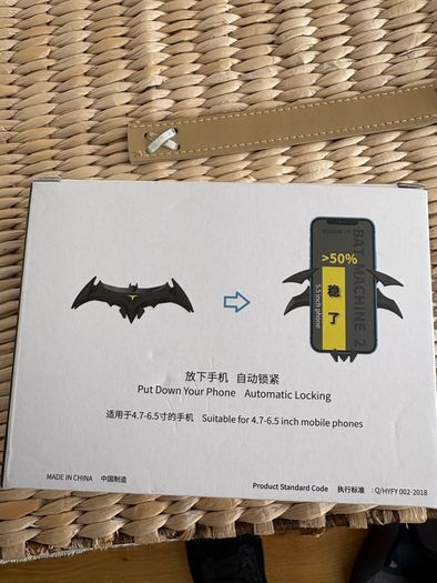 Batman style phone holder