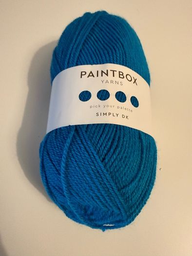 6 balls of blue yarn wool