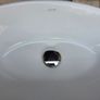 Countertop basin with countertop mounted tap Image 9