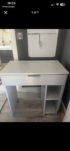 Grey dressing table needs repair