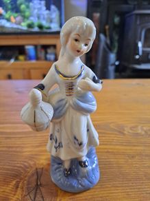 Vintage porcelain figurine woman