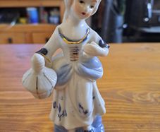 Vintage porcelain figurine woman
