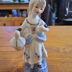Vintage porcelain figurine woman