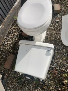 Toilet and cistern , sink and taps