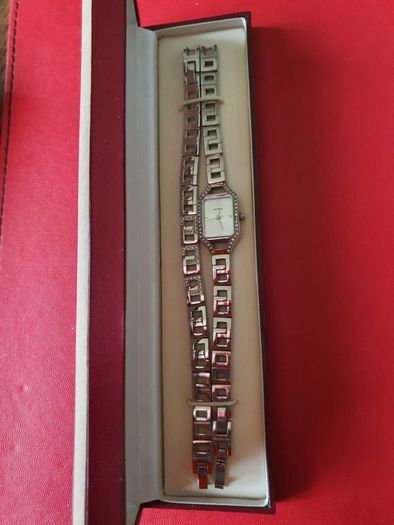 silver watch and matching bracelet
