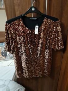 Ladies sequinned top.