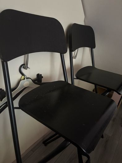Four black Ikea high stools