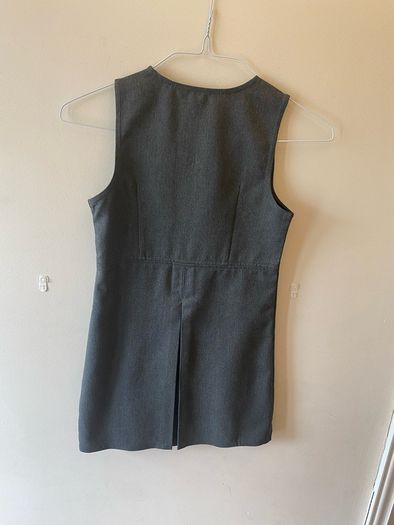 Dunnes grey pinafore (as new) age 8-9