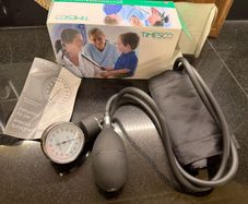 Timesco professional aneroid sphygmomanometer set with a dial gauge, inflation bulb, and black nylon cuff  blood pressure