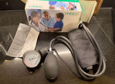 Timesco professional aneroid sphygmomanometer set with a dial gauge, inflation bulb, and black nylon cuff  blood pressure
